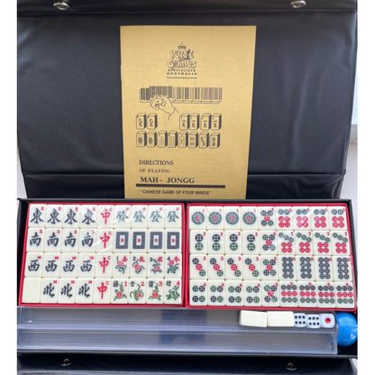 Travel  Mahjong in a black vinyl case with Racks